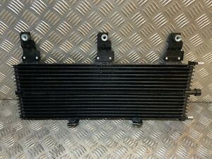 NISSAN NAVARA QR25DE VQ40DE Fahrzeugmodell Motorenölkühlermontage 21606-EB405 für den Markt